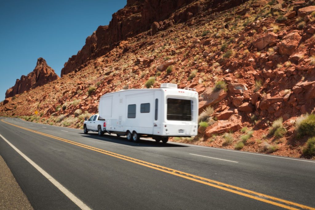 Truck pulling 5th Wheel RV in Western US