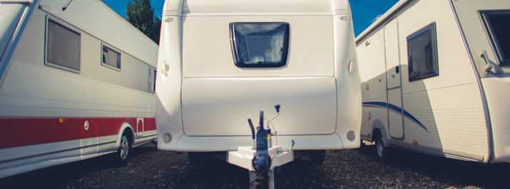 An RV dealer lot with different types of RVs.